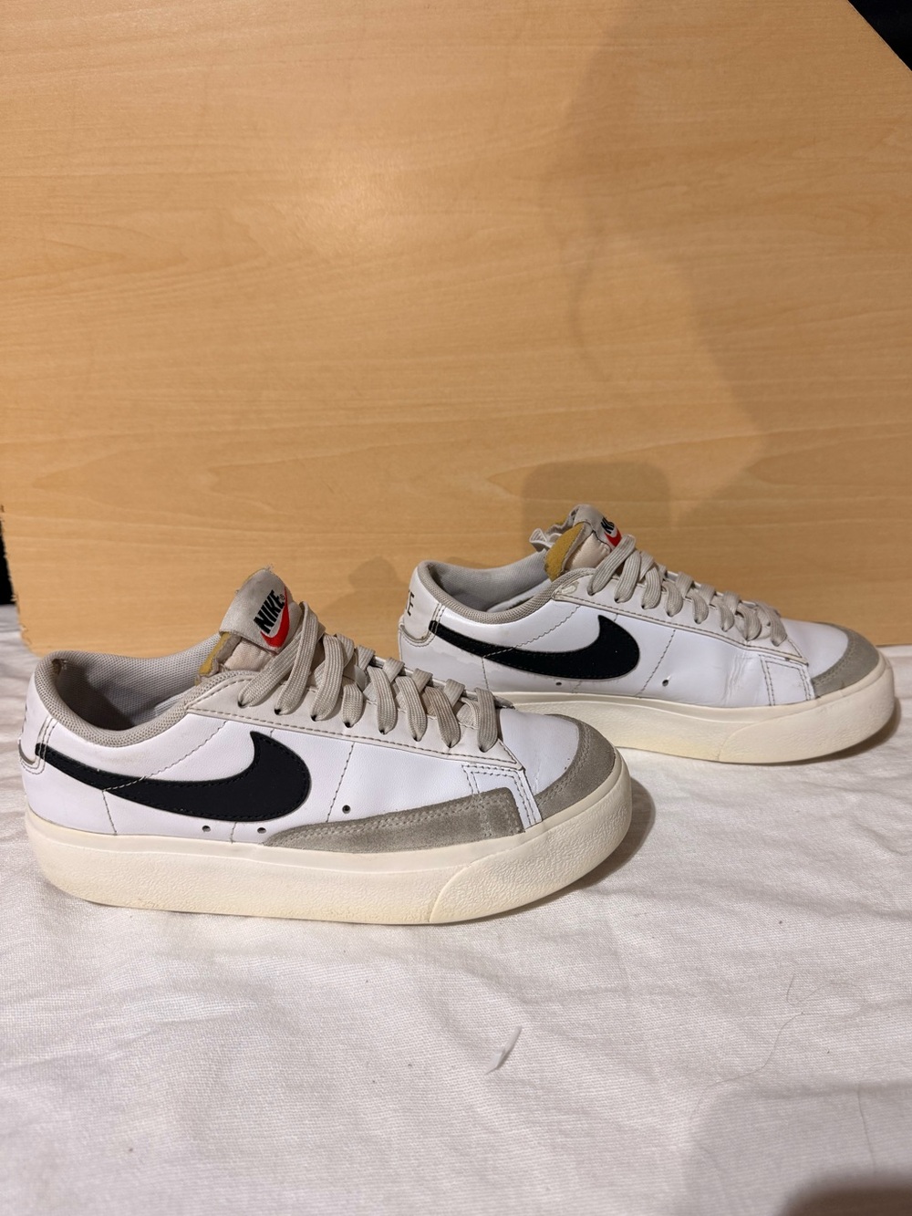 Nike White Sneakers with Black Swoosh and Gray Accents